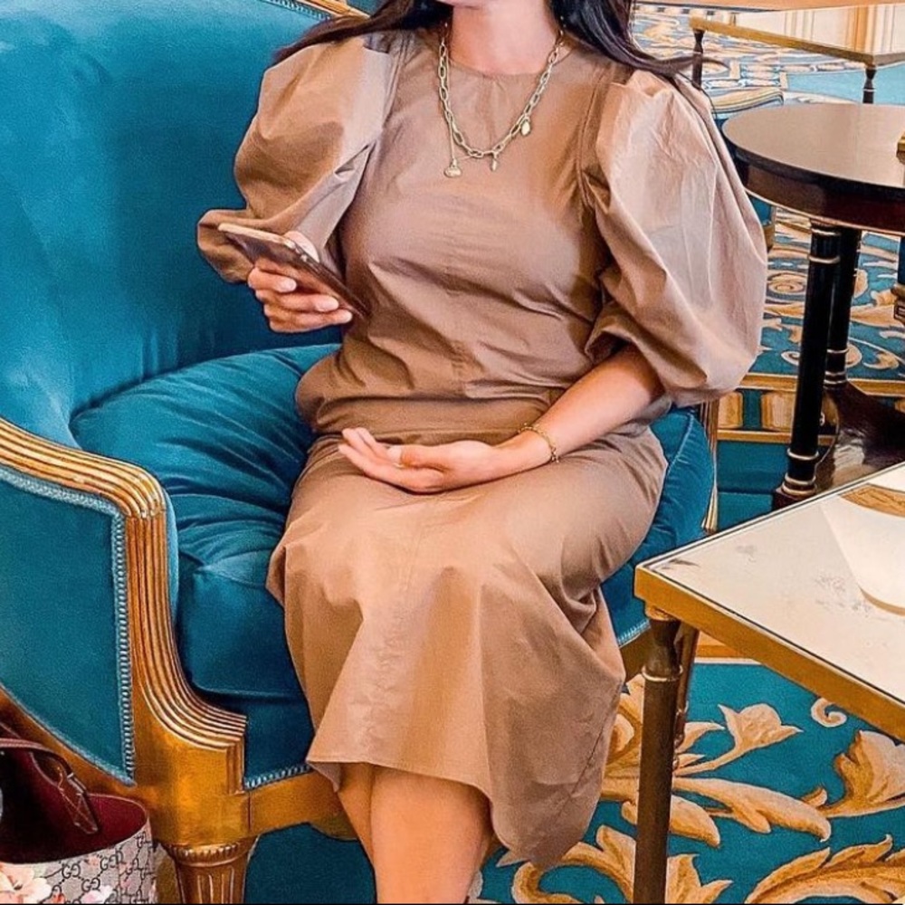 brown H&M midi dress with dramatic puffy shoulder